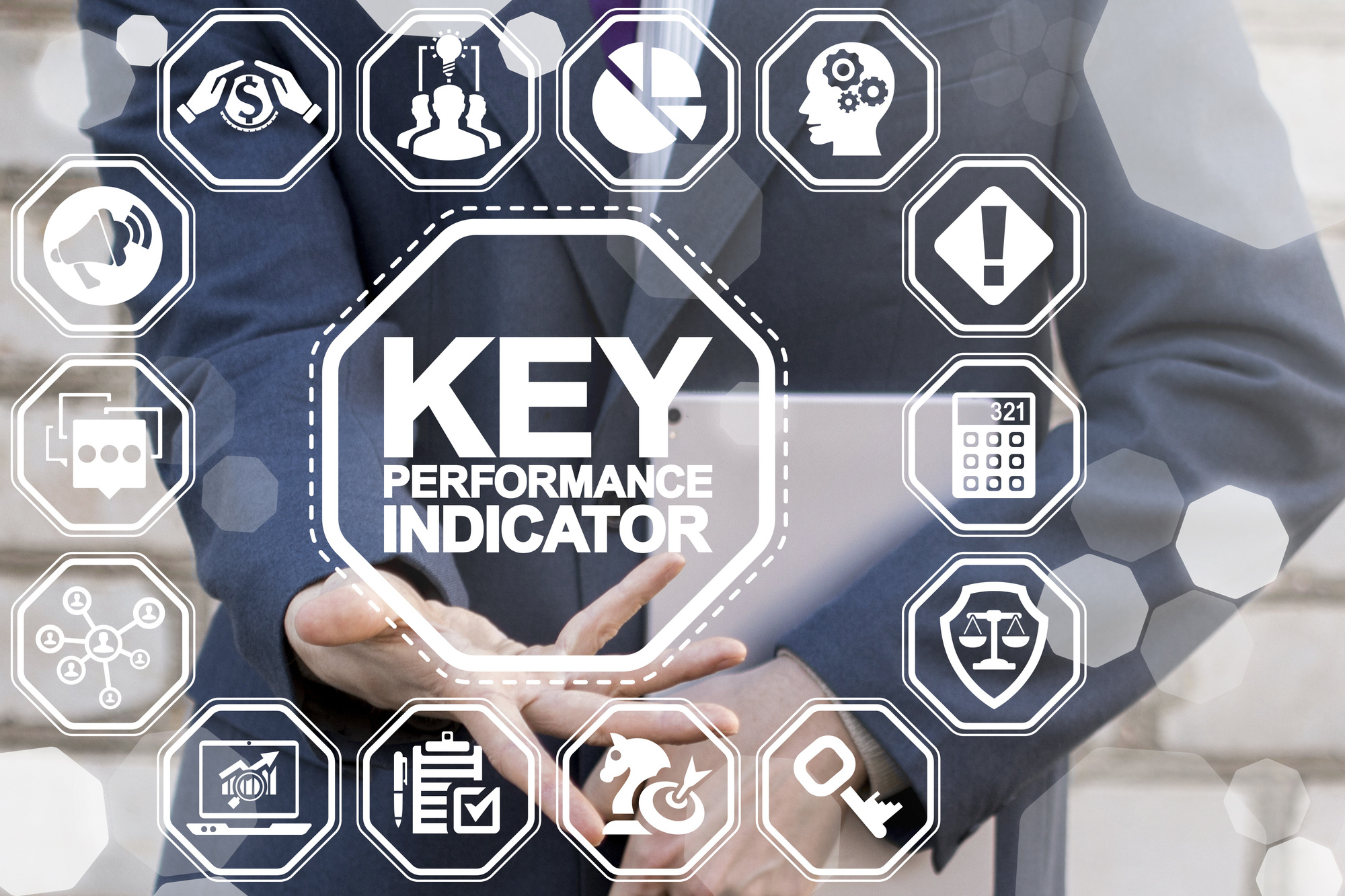 Key Performance Indicator (KPI) using Business Intelligence (BI) metrics to measure achievement versus planned success target. Man represent kpi text icon on virtual screen